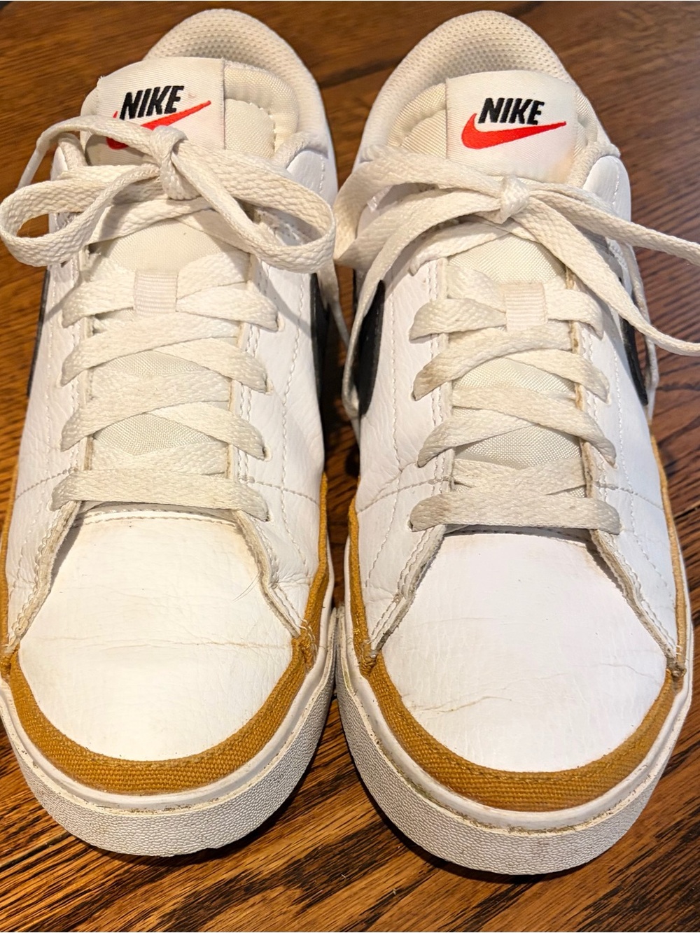 Nike White Sneakers with Black Swoosh and Tan Trim
